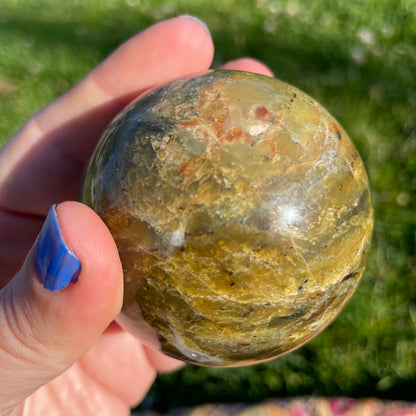 beautifully variegated green opal spheres