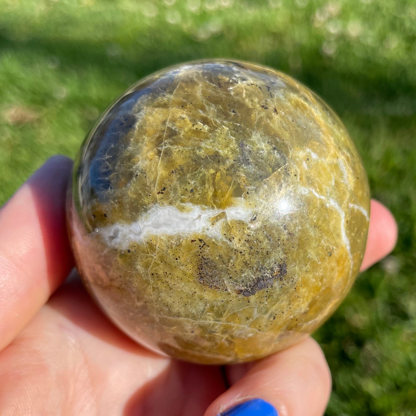 beautifully variegated green opal spheres