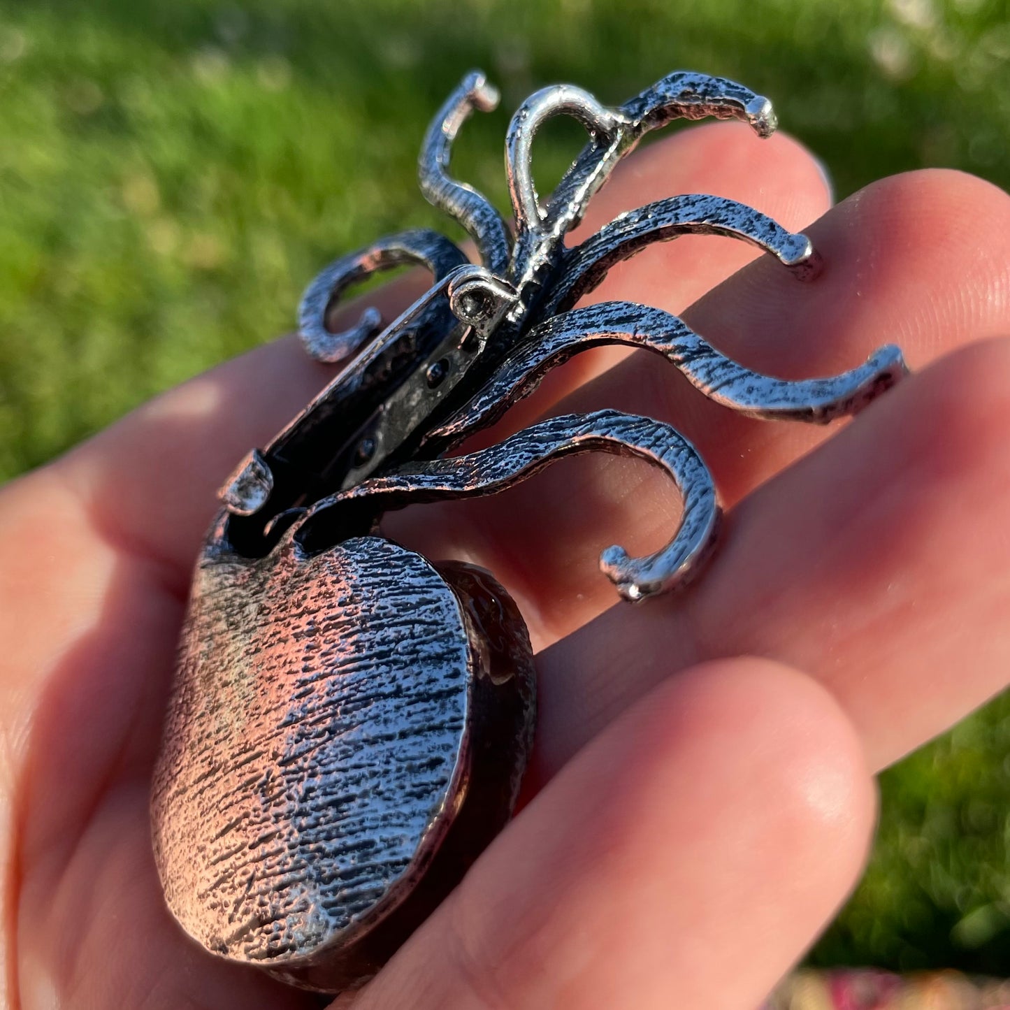 tentacly ammonite fossil pins (or pendants)