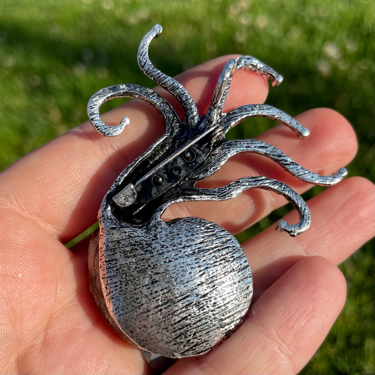 tentacly ammonite fossil pins (or pendants)