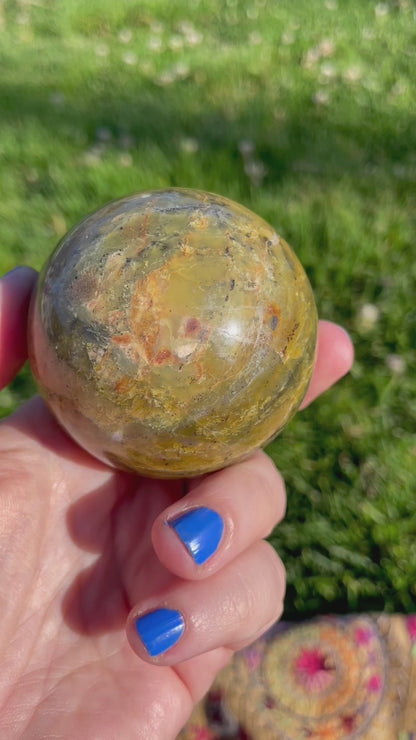 beautifully variegated green opal spheres